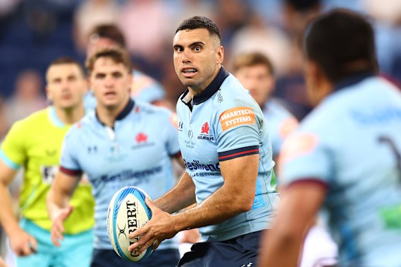 Jack Debreczeni on the attack for the Waratahs against the Blues.