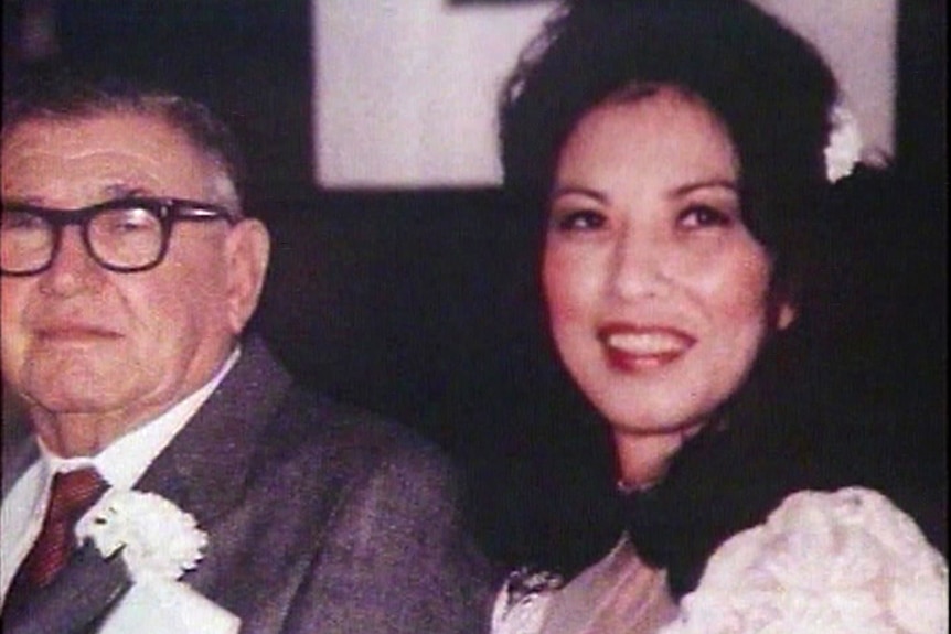 headshot of an elderly man and a woman on their wedding day