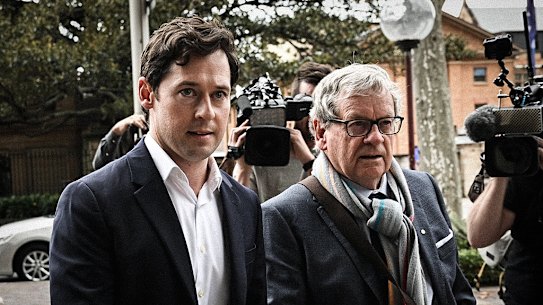 Nick McKenzie (Left) and Chris Masters outside court after Ben Roberts-Smith lost his defamation action.