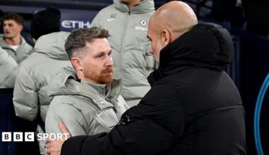 Calum McFarlane embraces Pep Guardiola after drawing at Manchester City earlier in the season