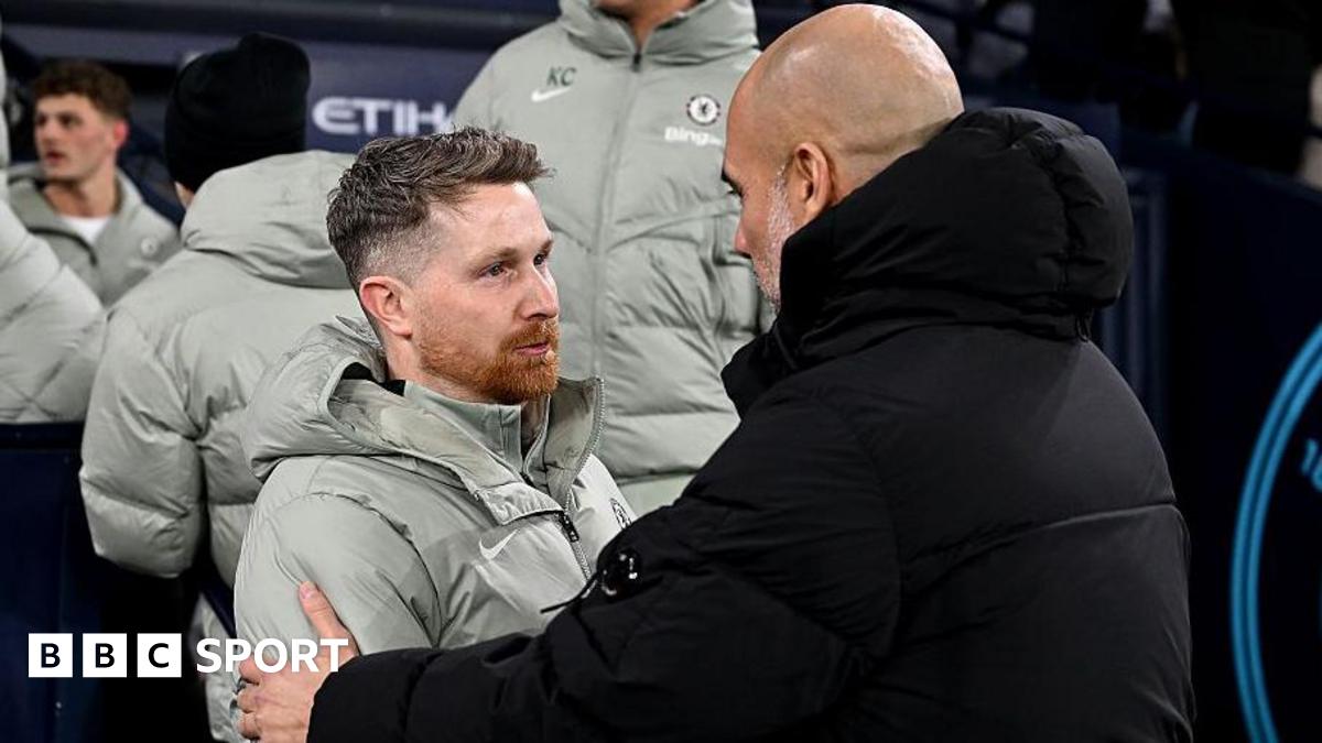 Calum McFarlane embraces Pep Guardiola after drawing at Manchester City earlier in the season