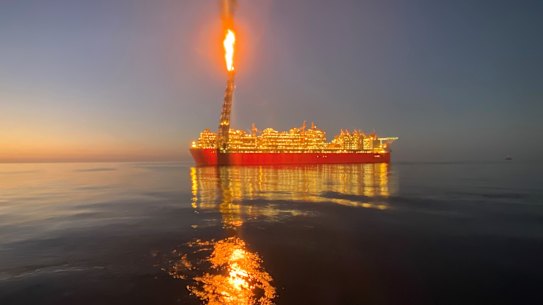 Shell’s Prelude floating LNG vessel off the WA coast flaring excess gas.