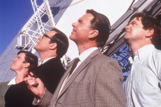 Sam Neill and three actors in front of the Dish
