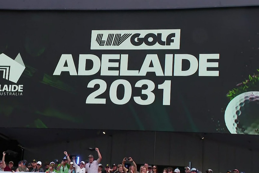 Fans celebrate at the Grange Golf Club following a LIV Golf announcement.