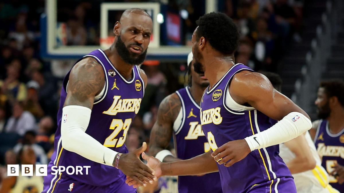 LeBron James and son Bronny on court for LA Lakers against Golden State Warriors