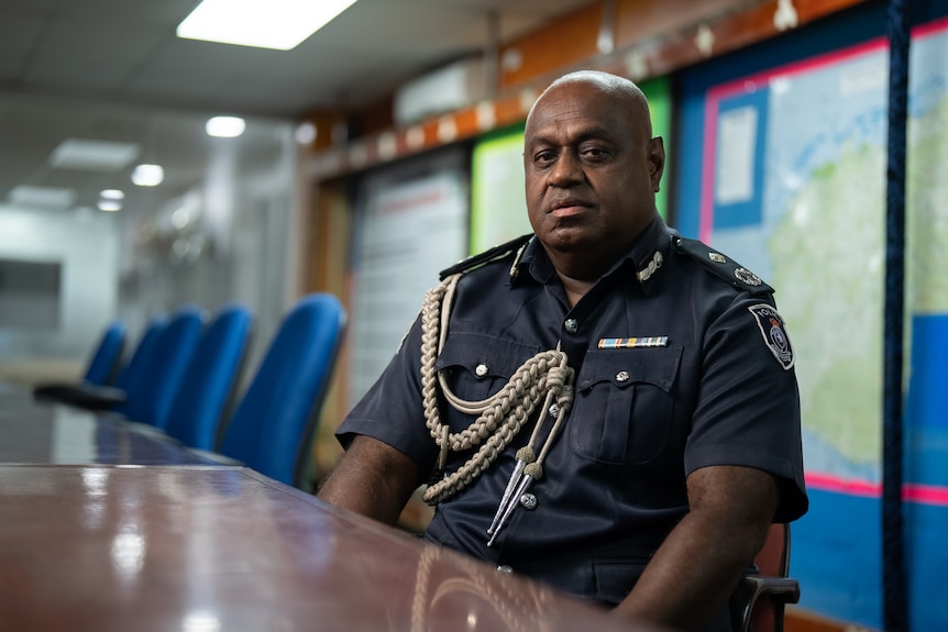 A man at a conference table.