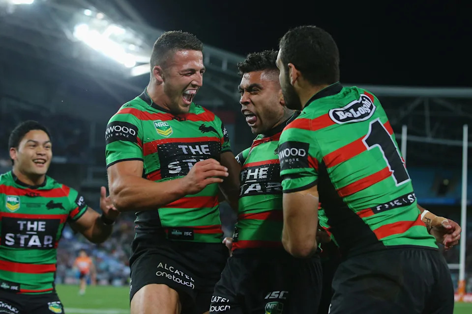 Seen here, Nathan Merritt celebrates with Rabbitohs during the 2013 NRL preliminary final against Manly.