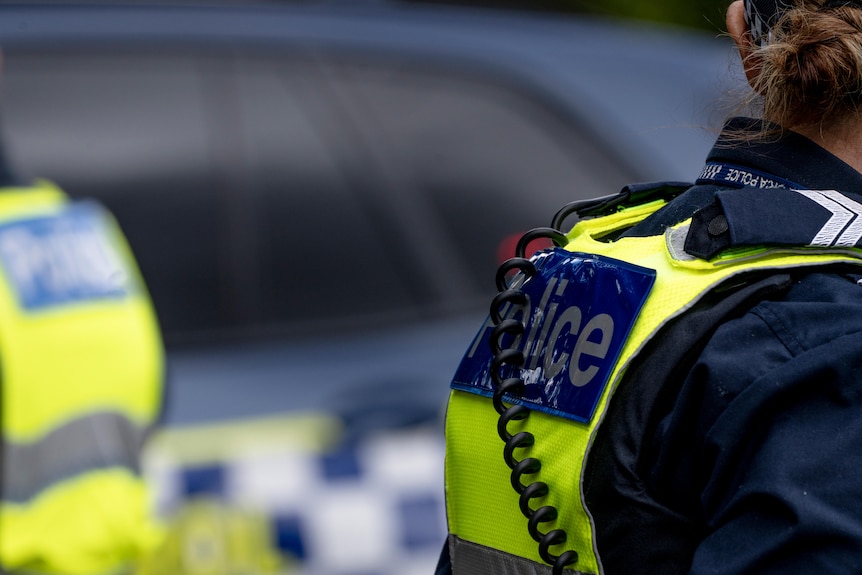 Victorian police officer from behind