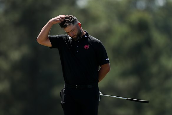Jon Rahm reacts on the 18th green during the second round of the 2026 Masters Tournament at Augusta National.