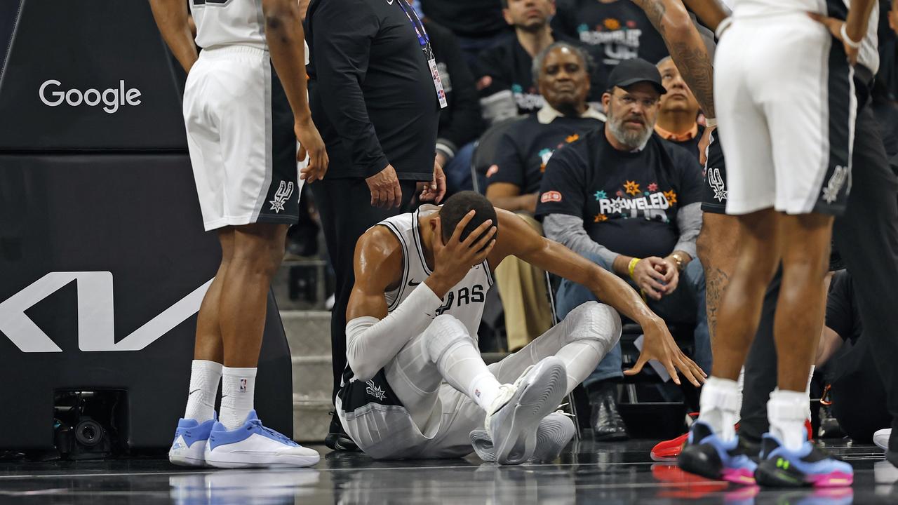 Victor Wembanyama leaves court with concussion as San Antonio Spurs lose second playoff game to Portland Trail Blazers