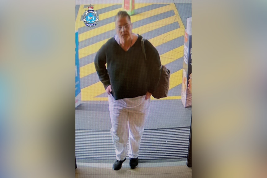 A CCTV image shows a woman wearing spectacles, light-coloured pants and black shoes.