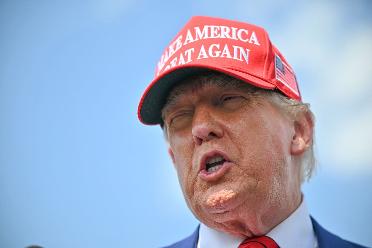 US President Donald Trump speaks to the press upon arrival at Morristown Municipal Airport in Morristown, New Jersey