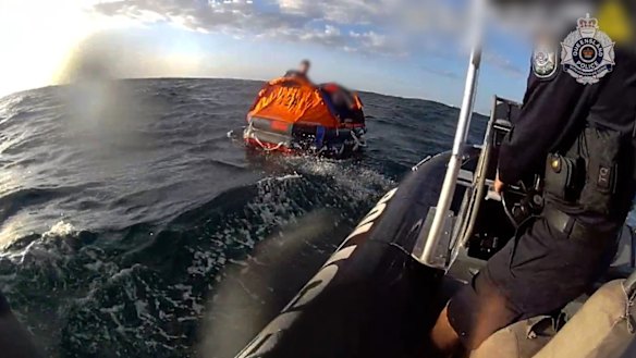 The AMSA aircraft dropped a life raft down to the pair.