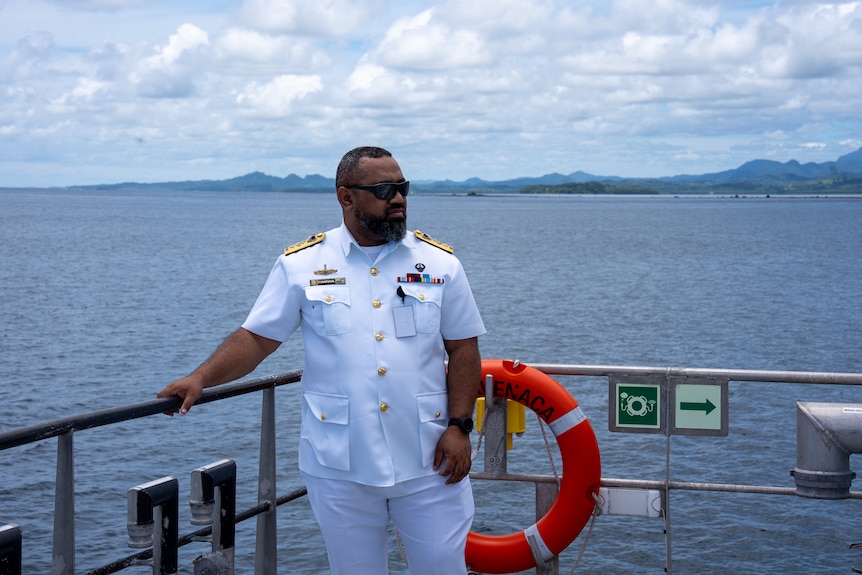 A man on a naval vessel.