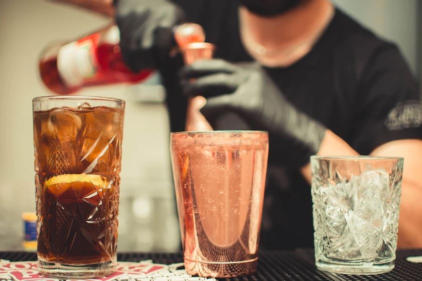 A bartender making drinks