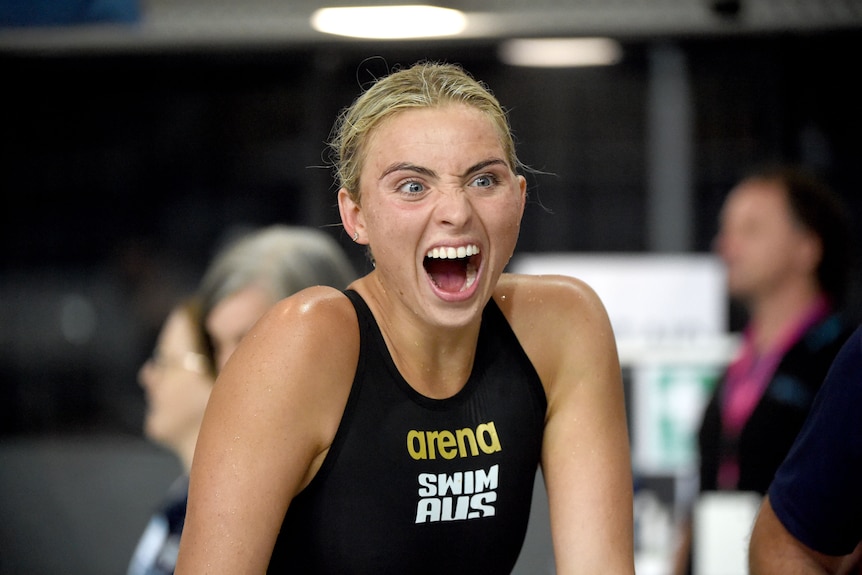 Alexa Leary reacts with her mouth wide open