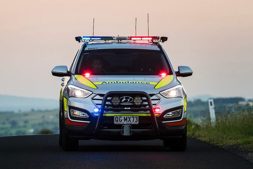 Queensland Ambulance Service emergency response vehicle, responding to a call in a rural area.