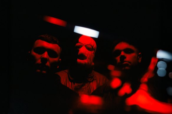 Kneecap in a 2026 publicity shot: (l-r) Mo Chara, DJ Próvaí, Móglaí Bap.
