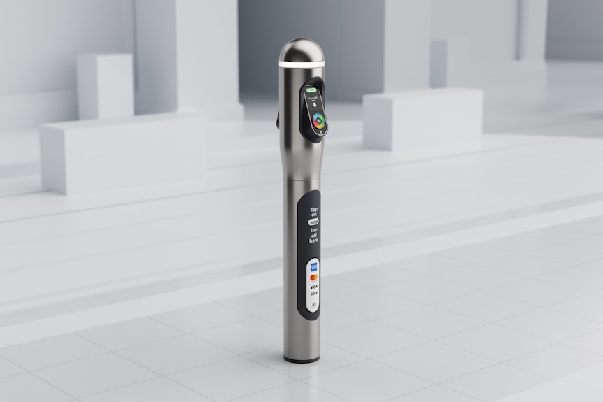 A single tap and pay station in the shape of a slim microphone with a circle indicating where to tap near the top.