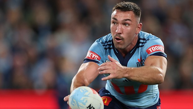 Reece Robson of the Blues passes during game three of the Men's State Of Origin.
