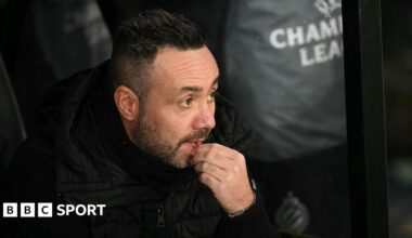 Screengrab showing a Brighton defender with his studs on the ball looking to draw out the opposition.