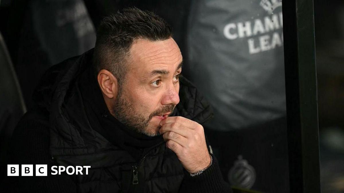 Screengrab showing a Brighton defender with his studs on the ball looking to draw out the opposition.