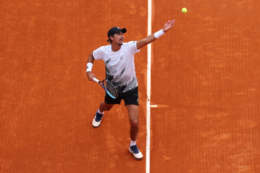 Alexei Popyrin serves