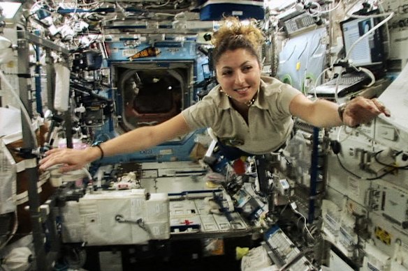 Space explorer Anousheh Ansari floats through the International Space Station.
