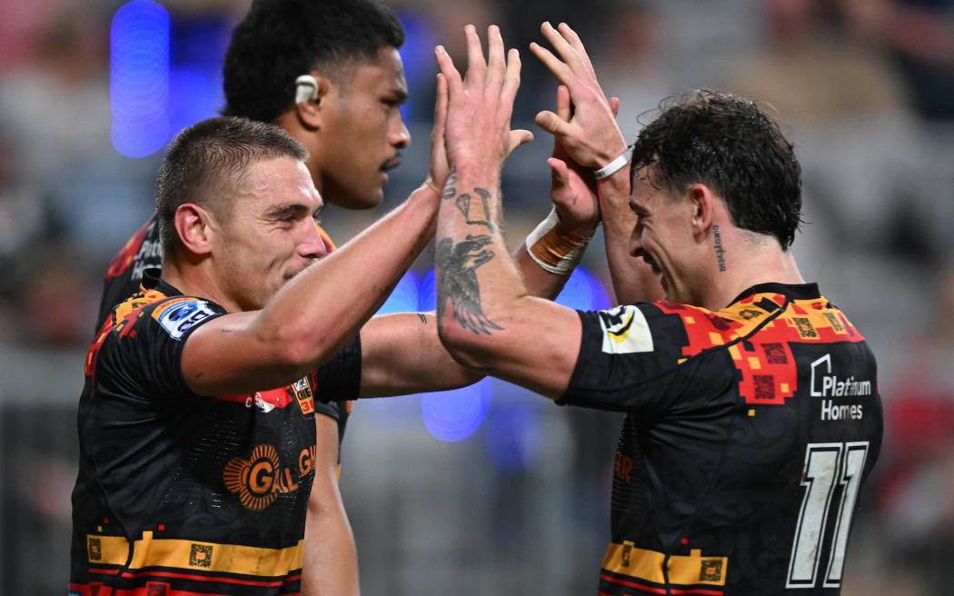 Cortez Ratima of the Chiefs celebrates his try with Daniel Sinkinson of the Chiefs, Chiefs v Fijian Drua, round 11 Super Round of the 2026 Super Rugby Pacific competition at One New Zealand Stadium, Christchurch.