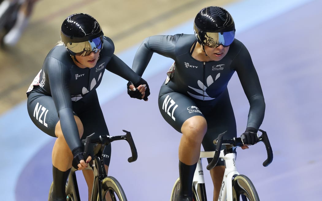 Bryony Botha and Pru Fowler contest the women's Madison at the track cycling World Cup in Malaysia.