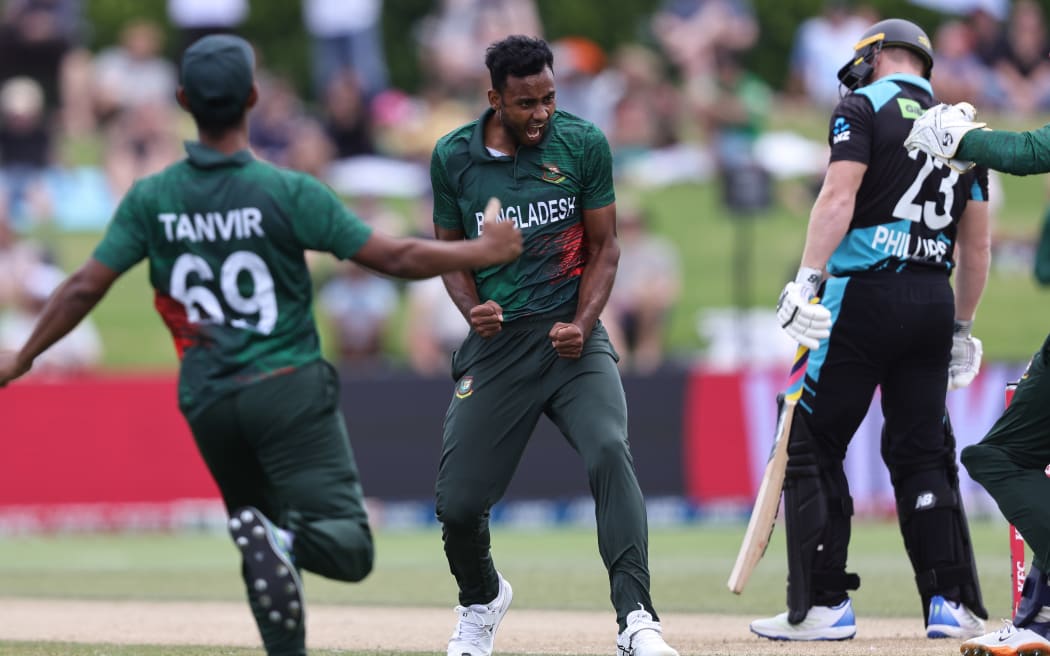 Shoriful Islam of Bangladesh celebrates the wicket of Glenn Phillips, 2023.