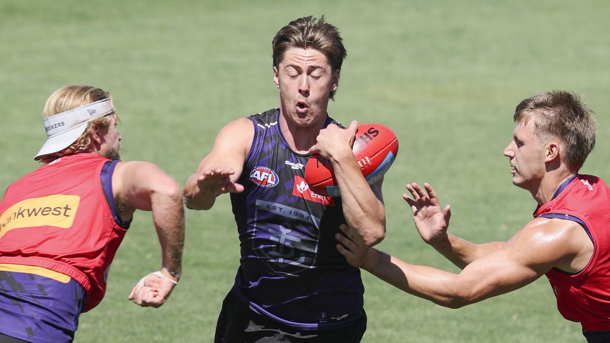 Fremantle Dockers forward Tobyn Murray learning off Sam Switkowski and Michael Frederick
