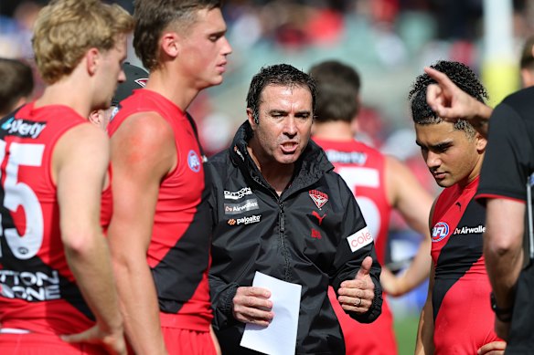 Essendon coach Brad Scott implores his players in last Saturday’s win over Melbourne.