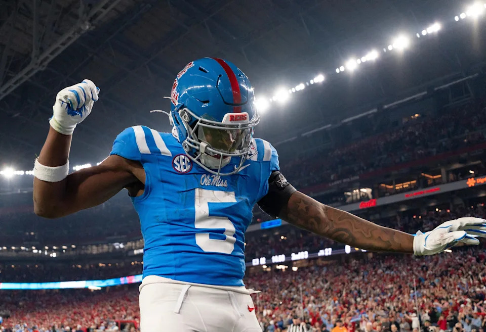 Ole Miss running back Kewan Lacy (5) celebrates after scoreing a touchdown during the CFP Fiesta Bowl against Miami at the State Farm Stadium, in Glendale, Ariz., on Thursday, Jan. 8, 2026.