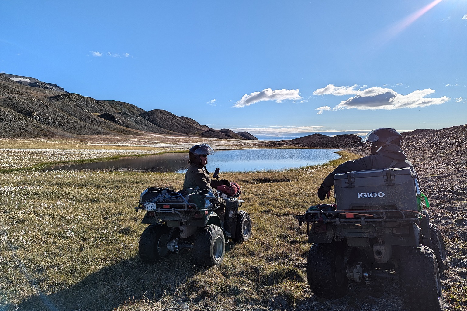 Research team using ATVs to get around Ellesmere Island. Large parts of the Canadian Arctic are uninhabited, and wildlife disease outbreaks can go unnoticed. Conducting field research in places like Ellesmere is logistically challenging and expensive.