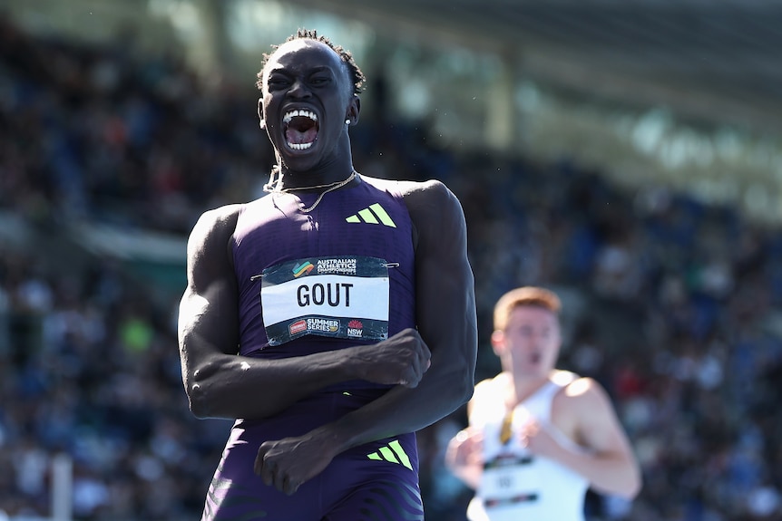 A man celebrates after breaking an Australian record
