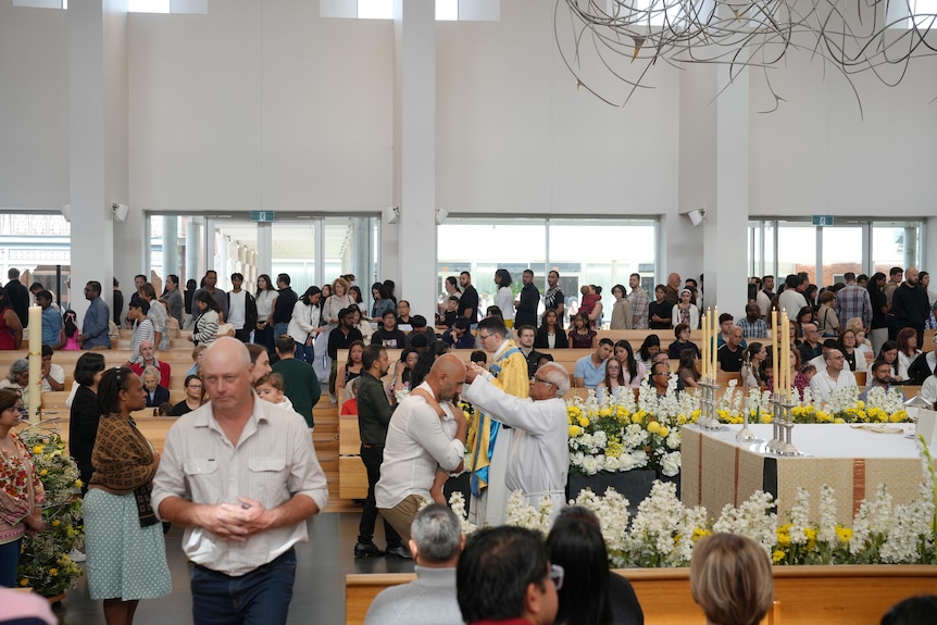A man receiving communion
