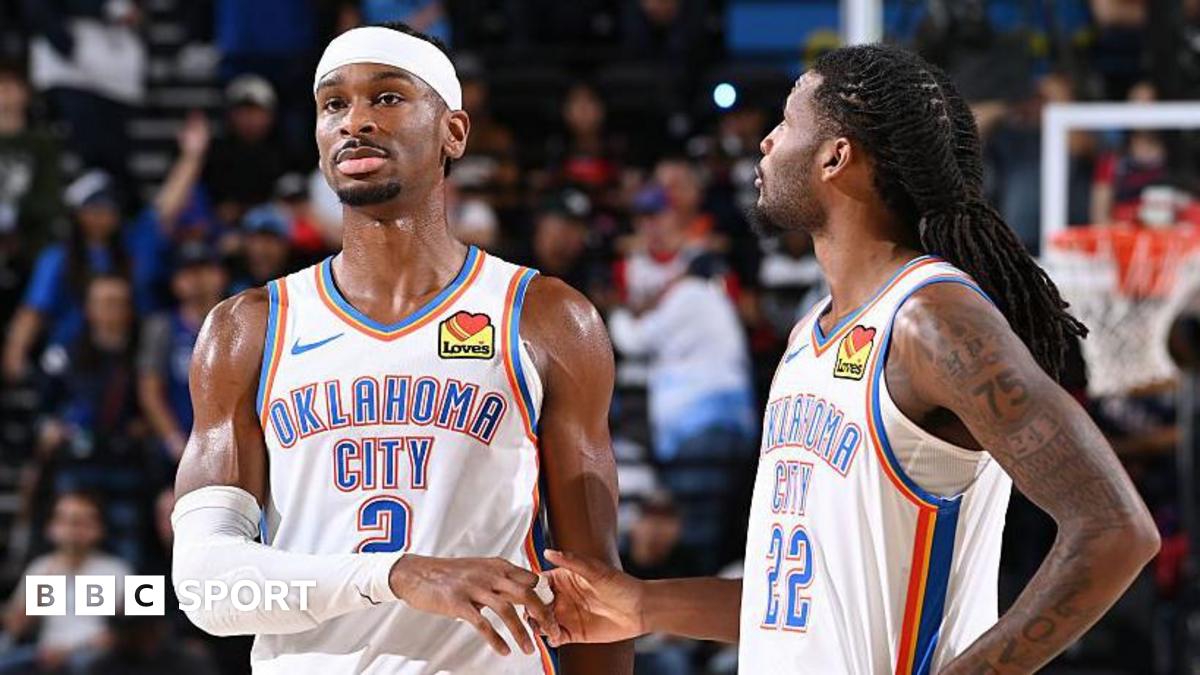 Shai Gilgeous-Alexander (left) and Cason Wallace (right) of the Oklahoma City Thunder shake hands