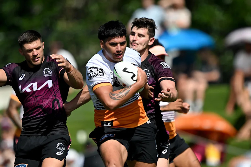 Pictured centre, Brisbane Broncos forward Ben Te Kura at training.