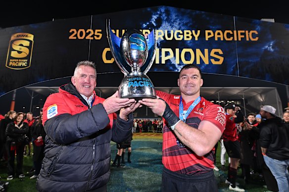 The Crusaders lifting the trophy after winning the 2025 Super Rugby Pacific grand final.