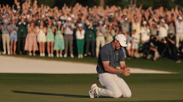 McIlroy celebrates his victory last year.