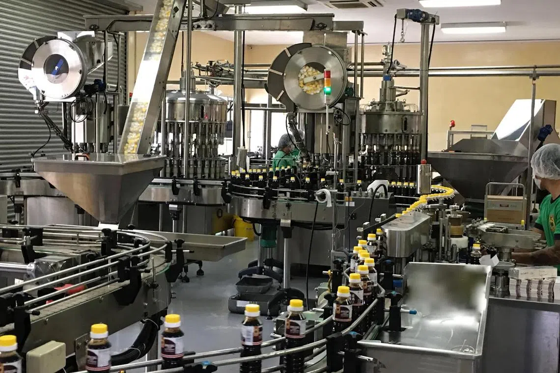 Tai Hua Food Industries' packaging line for Tai Hua soya sauce at its 12 Jalan Besut factory in Jurong district.