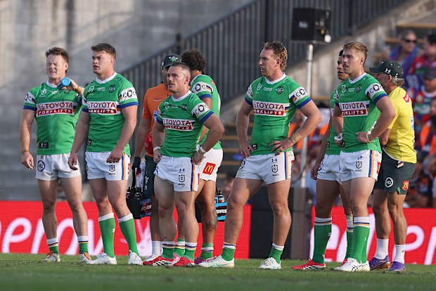 Raiders players react to a Knights try.