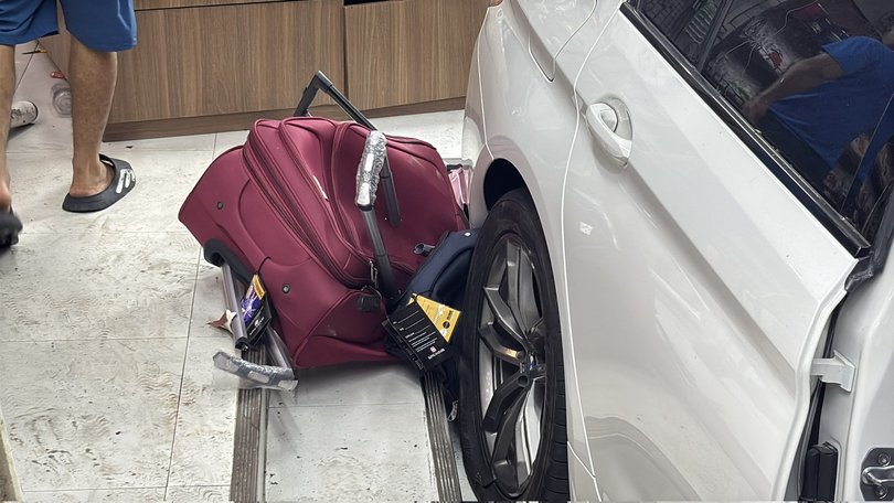 A masseuse who witnessed the incident said there was screaming when the car mounted the curb.