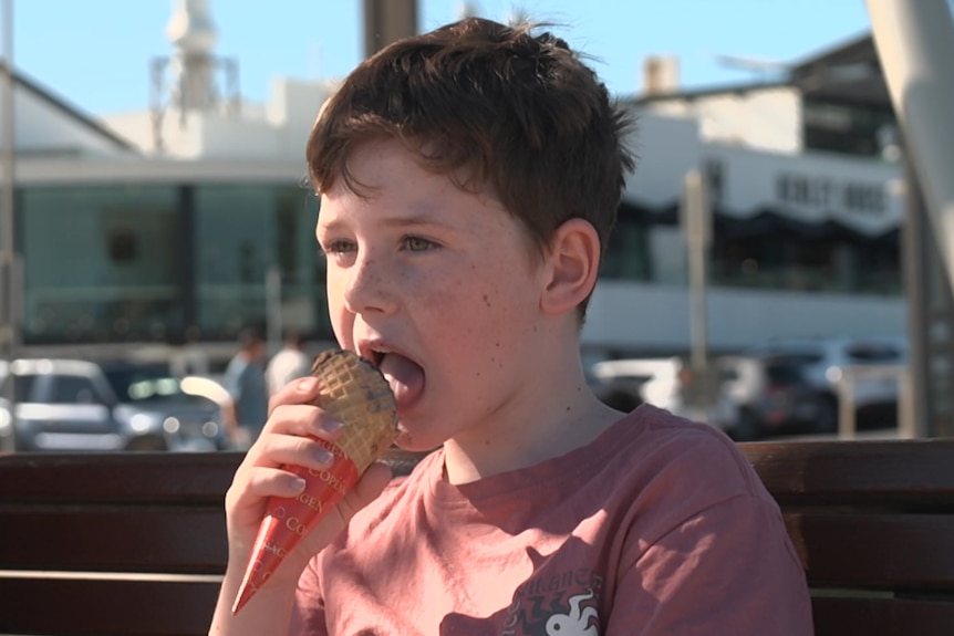 A boy eating ice cream