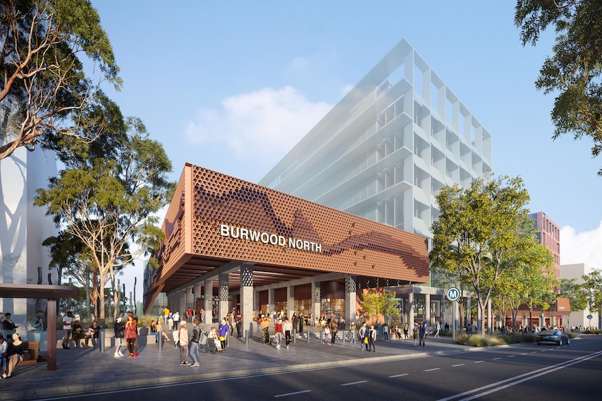 A number of pillars hold up the slatted roof of the Burwood North Metro West station, with a honeycomb-like facade.