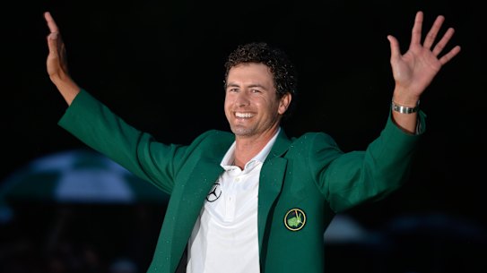 Adam Scott celebrates in his green jacket after winning the 2013 US Masters.