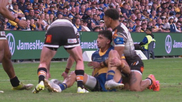 Bailey Simonsson dislocates his ankle during an airborne tackle.