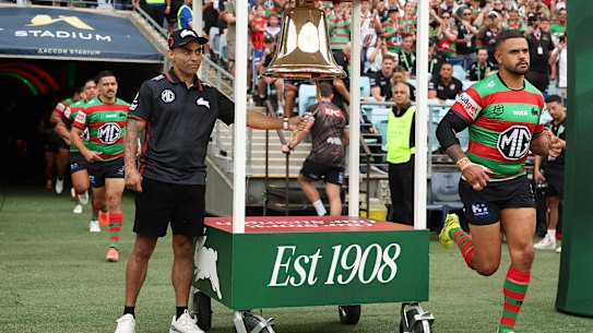 Nathan Merritt rings South Sydney’s Legacy Bell as the Rabbitohs take the field on Friday.