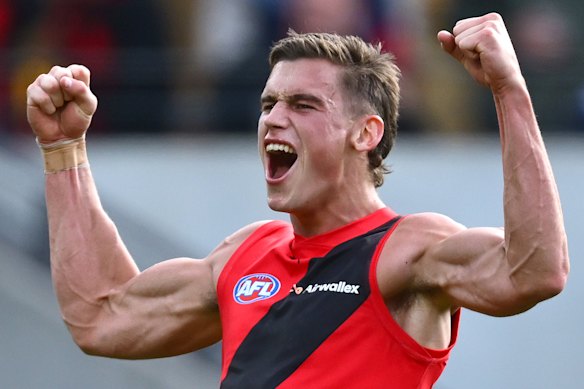 Archer May was crucial for the Bombers in their win over the Demons. He also happens to be the stepson of one of the figures the red-and-black faithful love to hate most, Hawks legend Dermott Brereton.